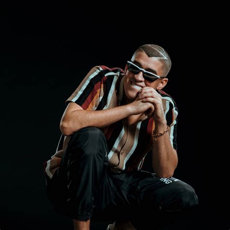 Bad Bunny wearing Prada SPR19U Sunglasses 